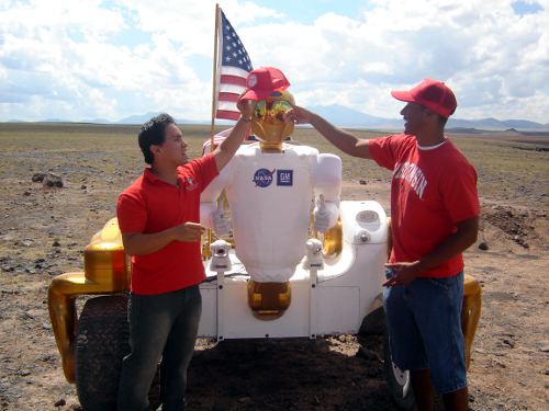 Will and Aaron make sure that Robonaut doesn't get a sunburn in the heat of the Arizona Desert.